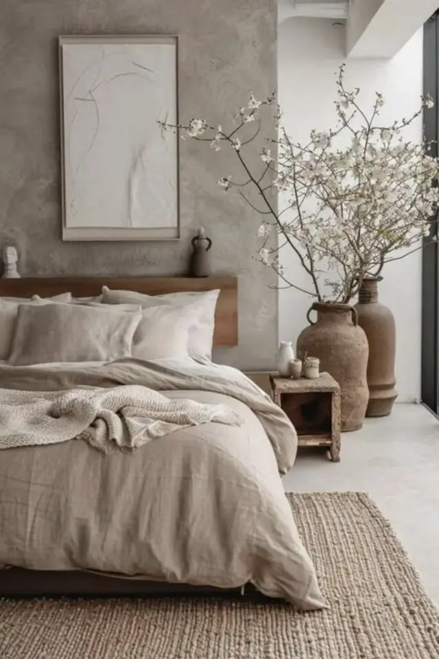 caracteristique decoration zen chambre adulte couleurs neutres beige écru gris matériaux naturels douceur et apaisement 
