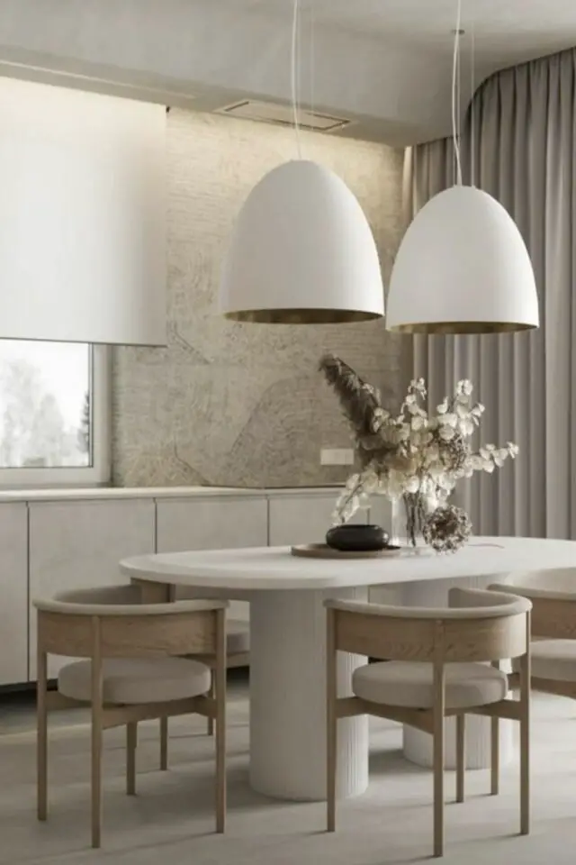 table de salle à manger ovale blanche écru style slow living grandes suspensions moderne 