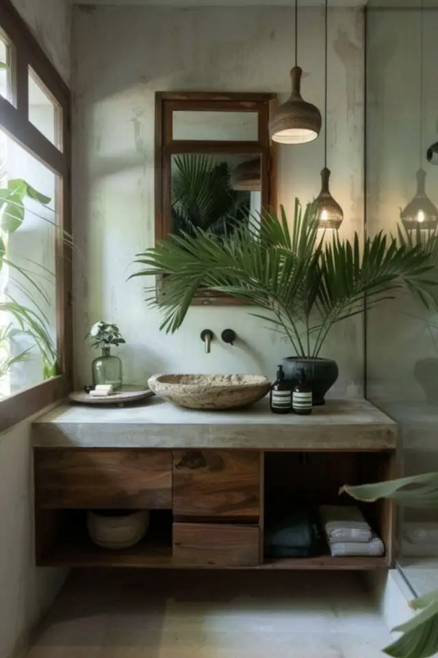 exemple déco salle de bain verte très clair ambiance nature vasque en pierre meuble en bois plante verte