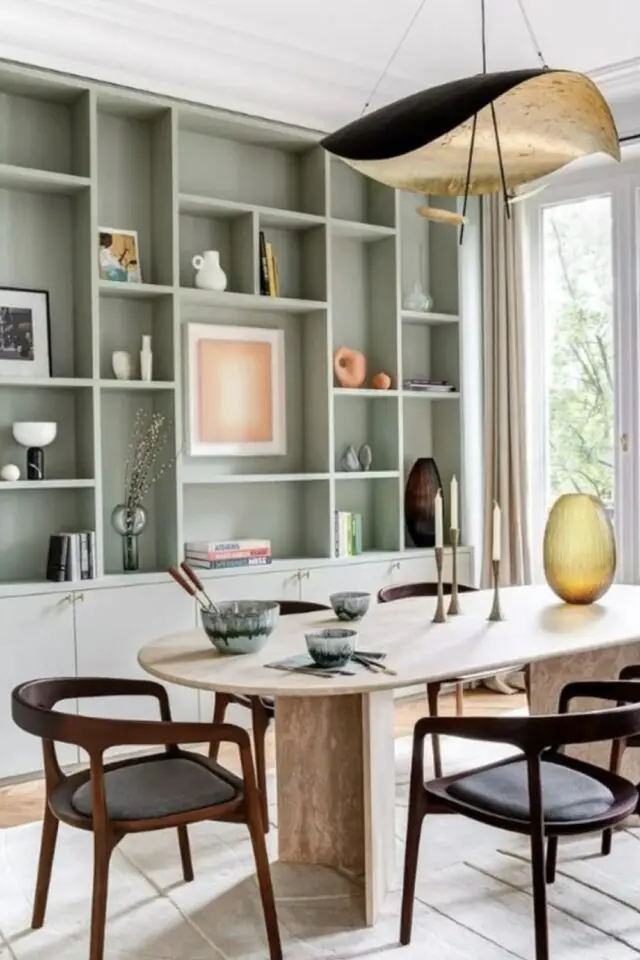 meuble salle a manger rangement mobilier sur mesure bibliothèque avec bas porte couleur vert sauge table ovale élégante 